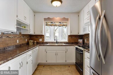 Enameled cabinetry, stainless side by side refrige