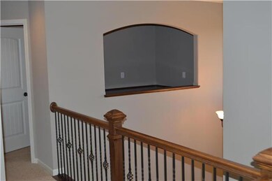 Second floor office opens to entry