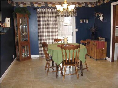 Notice the beautiful tile in the large dining room