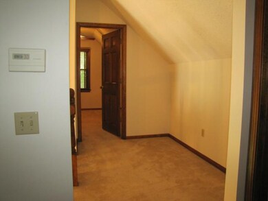 Loft could be used for computer center.