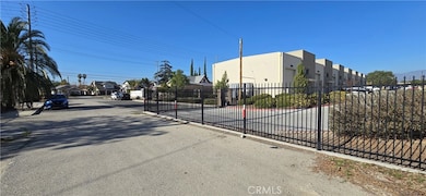 Look back to entrance to lot off of B Street.