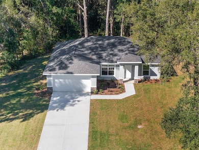 158 E Runic, Citrus Springs, FL 34434 - photo 2