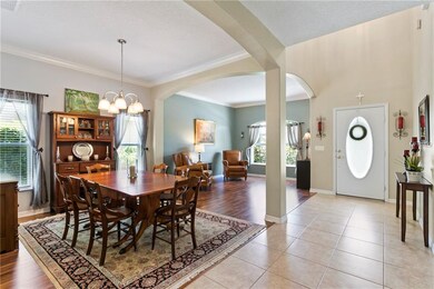 Crown Molding, Columns and lots of sunlight.