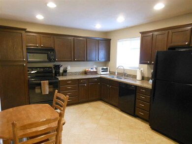 4-Kitchen with Granite and Porcelain Til