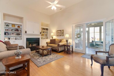 LIVING RM OPENS TO HTD & COOLED SUNROOM