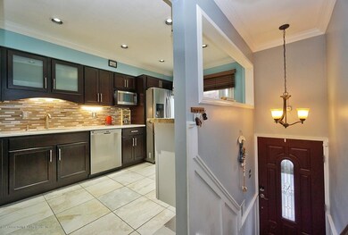 (4) Entry Foyer and Kitchen