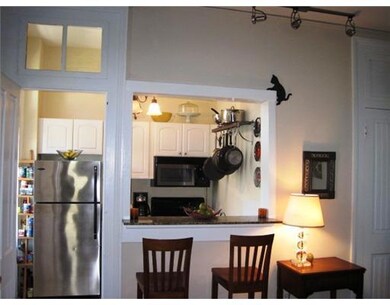 Kitchen. Kitchen now opens to living room with Bre