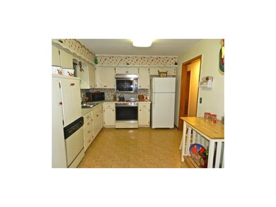 Large, bright kitchen. Priced to add your own touc