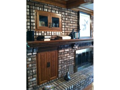 Fireplace in cozy family room.  Attention to detai