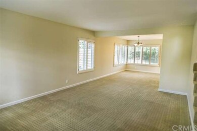 Spacious living and dining rooms include views of 