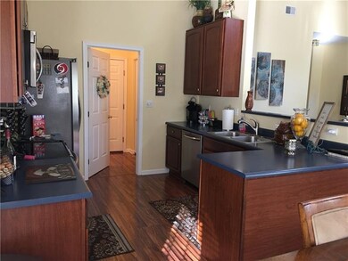 BAUUTIFUL CHERRY CABINETS WIT ALMOST NEW STAINLESS