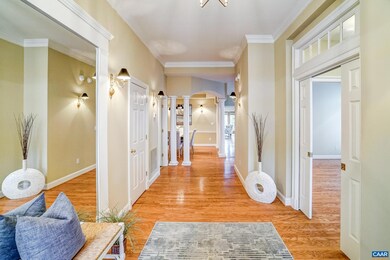 Hardwood floors, custom window treatments in this 