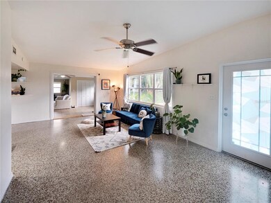 Front door and foyer area looking into living room