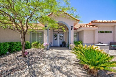 Property entrance with stucco siding and a tiled r
