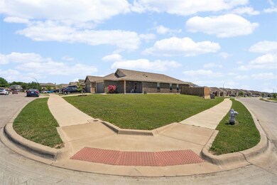 View of front of property featuring brick siding, 