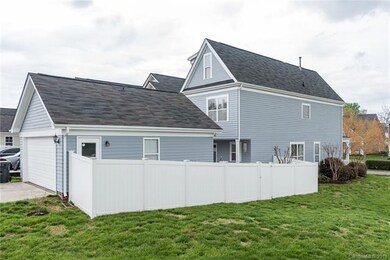 Great vinyl fence with gate to field. Extra large garage with attic storage.