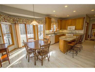 Eat in kitchen with granite island, granite counte