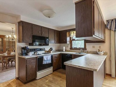 Kitchen. Hardwood flooring, new countertops, fauce