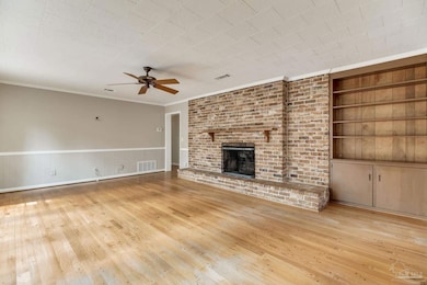 Inviting family Room with wood burning fireplace