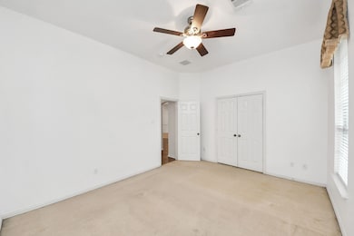 The first guest bedroom, located to the left of th