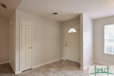 Foyer Entrance ~ Coat Closet ~ Open to Dining Room