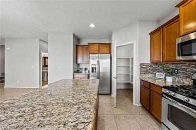 Walk in pantry and stainless steel refrigerator