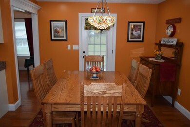 Dining area...door leads to screened rear porch and patio