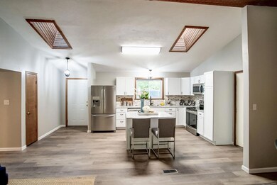 VAULTED, TWO SKYLIGHTS FOR NATURAL LIGHT.