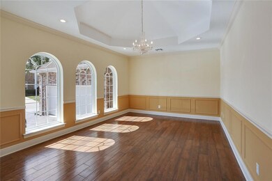 Wonderful formal living room , tray ceiling, chand