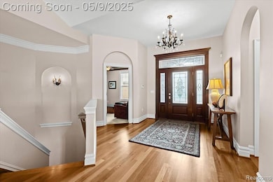 Entryway with beautiful hardwood flooring.