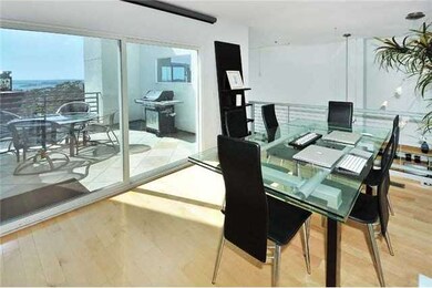Upstairs you'll find two spacious rooms and an expansive view balcony!