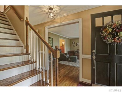 Entry foyer opens to Living Room.
