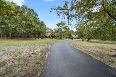 Driving up the driveway you are immediately pleased by this home and its distinctive appearance. The rich earthy tones of the wood blend seamlessly with the peaceful surroundings. It has wonderful curb appeal. (Trugreen is coming for a service, so this grass will start perking up)