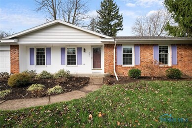 Covered front entry provides ample room for outdoo