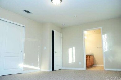 One of the two master suites upstairs.