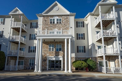 Spicket Commons unit 404, Methuen, MA 01844 - photo 4