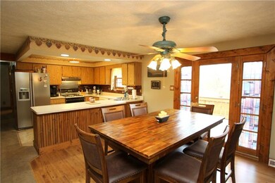 Open Floor Plan & Gorgeous Door leading onto Large