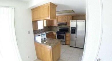 Kitchen, granite counters and stainless appliances