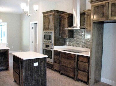 Custom kitchen features quartz counter tops!!