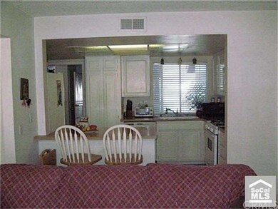 From the family room, looking into the kitchen