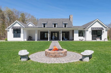 Back w wood burning fire pit