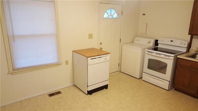 Large Kitchen! New Back Door!
