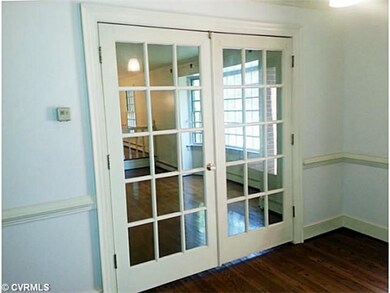 Foyer - Standing in the foyer, you open the French