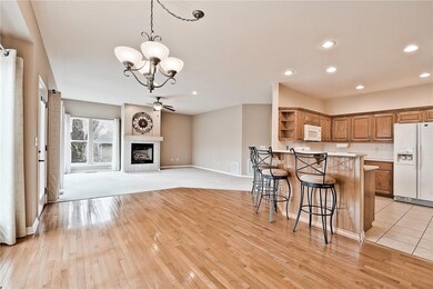 View from dining to living room. Stools, fridge and more to convey!