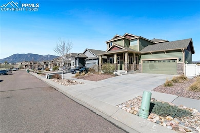 View of front facade featuring concrete driveway, 