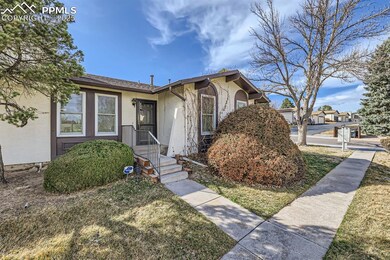 Bungalow-style house featuring stucco siding