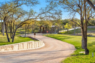 Surrounding community featuring curved driveway a
