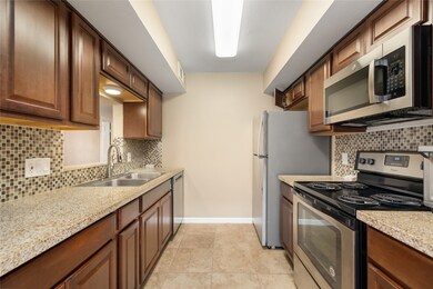 This kitchen features modern stainless steel appli