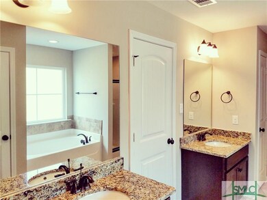 Master bath with oil rubbed bronze fixtures, grani