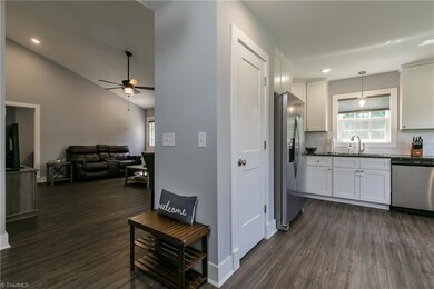 Soft grey walls and gorgeous luxury vinyl plank